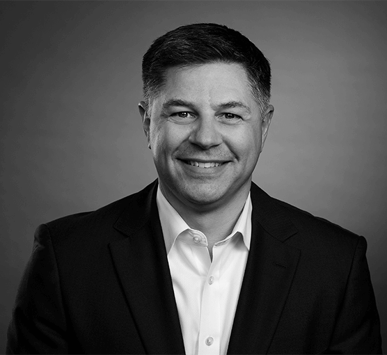 Black and white headshot of Jason Shields