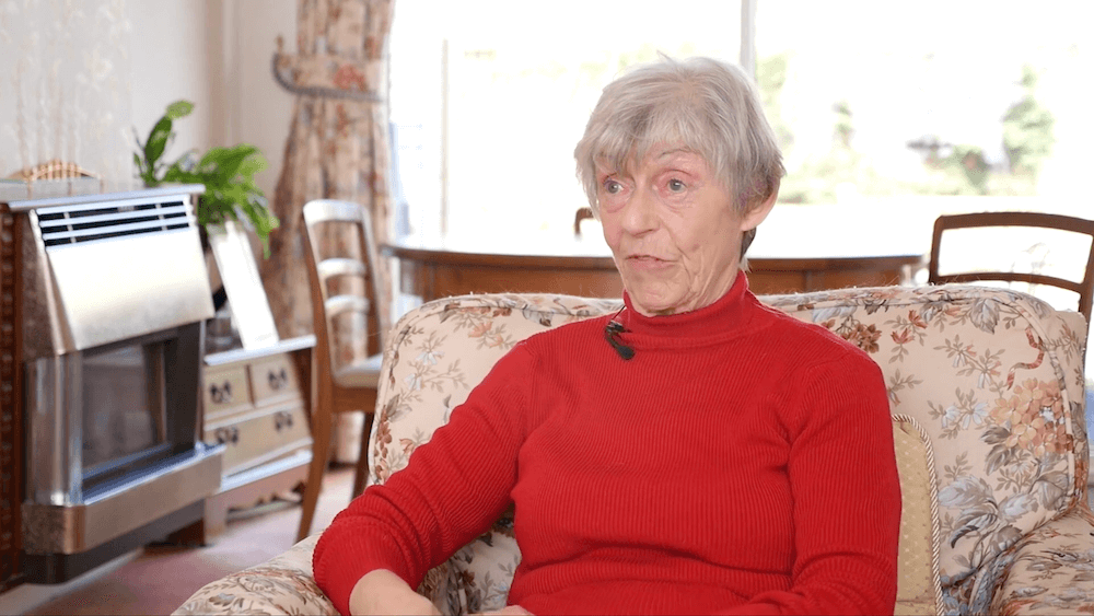 video thumbnail of woman sitting on couch and talking